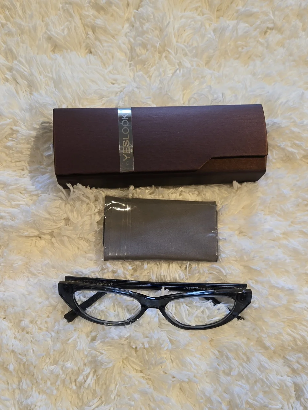 Woman's EYEGLASSES
